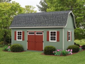 A small shed featuring a bright red door and matching shutters, set against a neutral background.