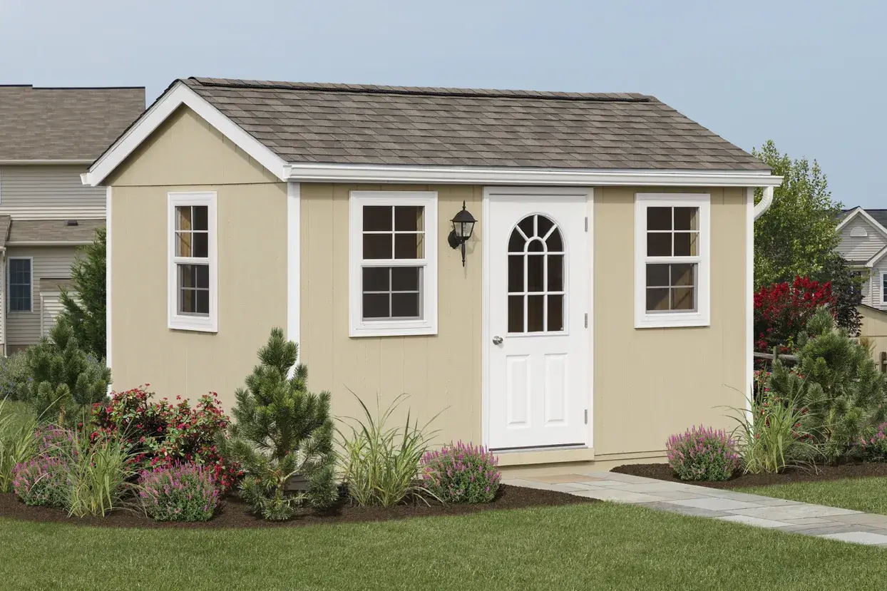 A small shed featuring a door and a window, set against a simple outdoor background.